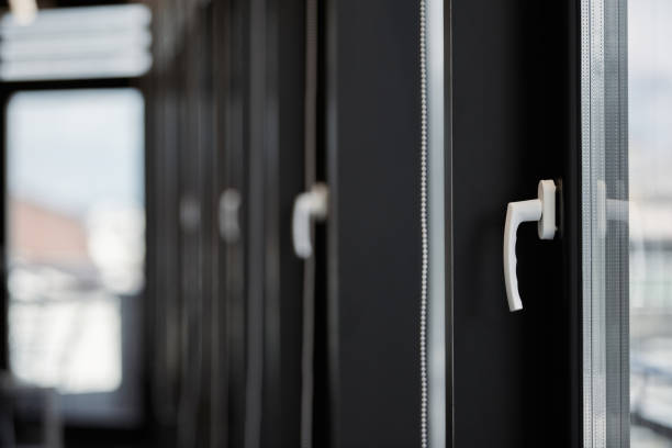 istock Windows row in office building. Modern windows with handles. Rows of windows in new apartment. 1184620037