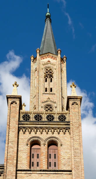 istock old brick church in front of blue sky 1184623756