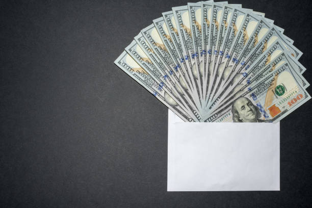 istock Money fan in the envelope 1184628895