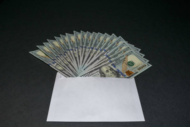 istock Money fan in the envelope 1184628907