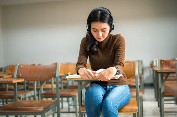 istock Female students studying in classrooms at the university 1184630360
