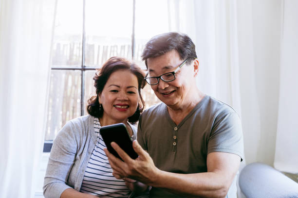 istock Senior couple taking selfie 1184631130