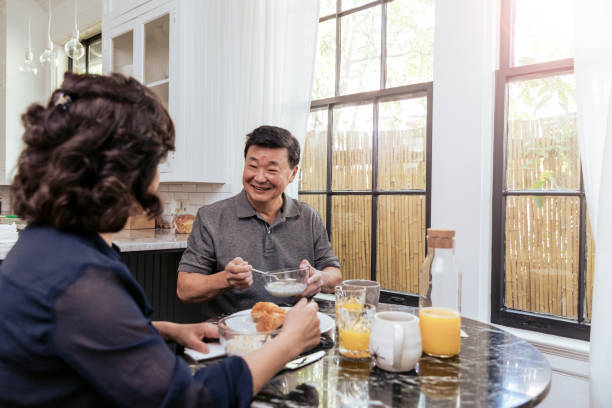istock Seniors having breakfast together 1184631222