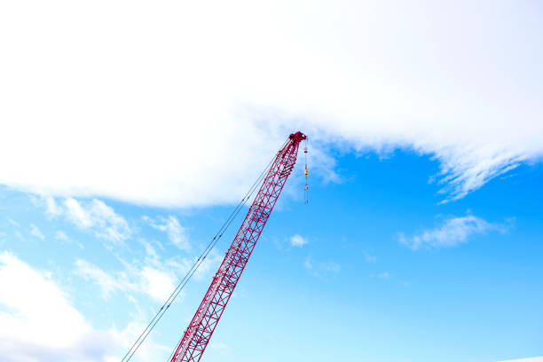 Construction site, building and crane, blue sky