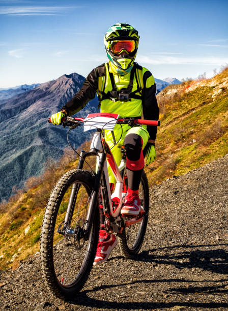 istock Man riding downhill mountain bike 1184636676