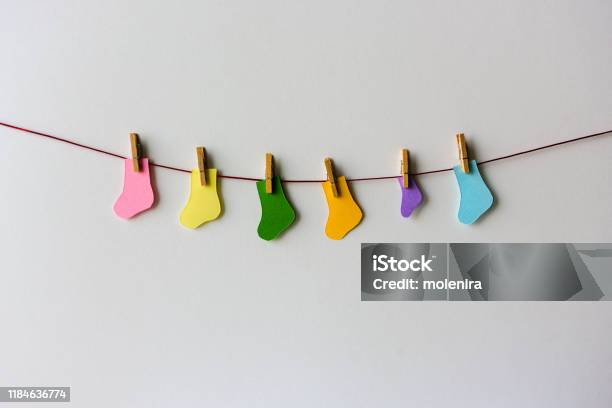 Premature Baby Day Concept Tiny Socks Stock Photo - Download Image Now - Miscarriage, Pregnant, Infertility
