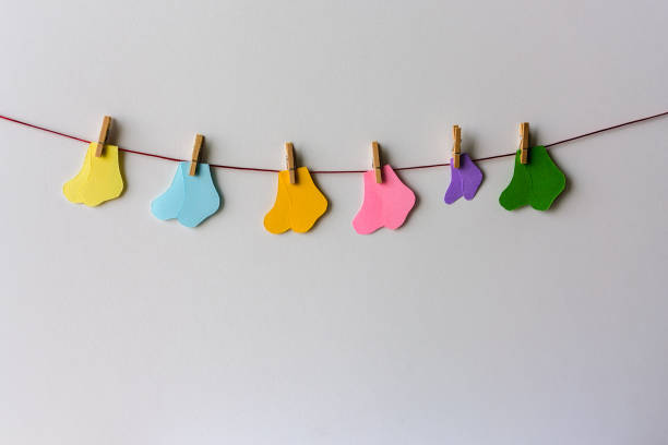 istock Premature baby day concept. Tiny socks 1184636947