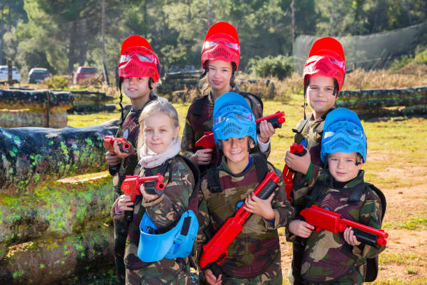 istock Kids ready for paintball game 1184638736