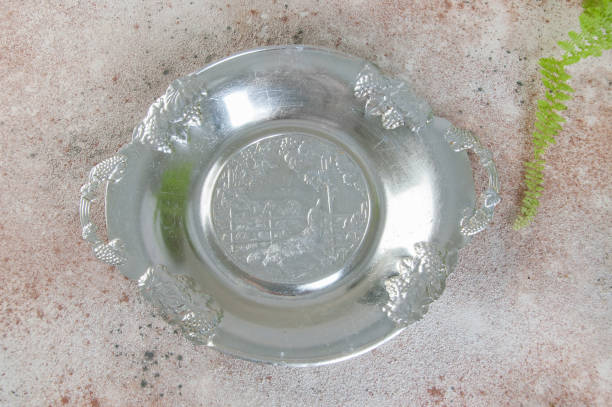 istock Vintage metal plate on concrete background. 1184638774