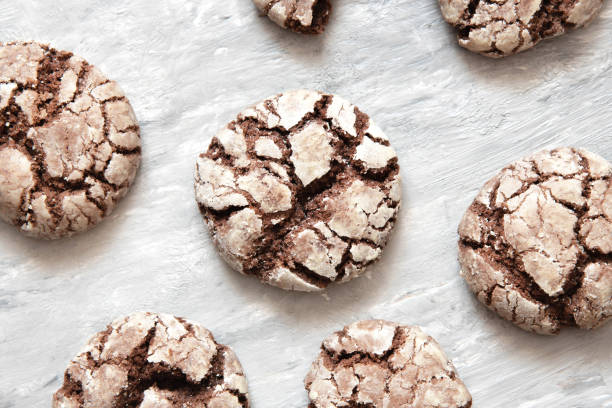 istock Chocolate Crinkles. Chocolate cookies in powdered sugar on a white background 1184640197