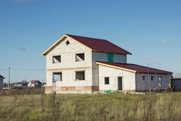 istock Development of land plot. Under construction house of aerated concrete blocks. Russia 1184642065