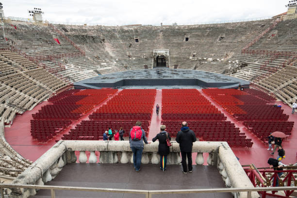Roman amphitheatre in Verona, Italy Verona, Italy - May 1, 2016: Roman amphitheatre in Verona, Italy. The place of annual festival operas . The Verona Arena is a roman amphitheatre built in 30 AD. verona opera stock pictures, royalty-free photos & images