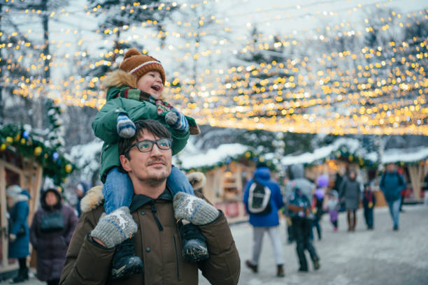 Family walking through Christmas market