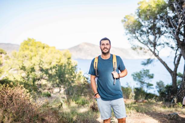 istock Young Bearded Spanish Day Hiker Enjoying Coastal Hike 1184651697