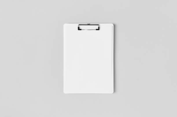 istock White clipboard mockup with a blank paper. Top view. 1184653260