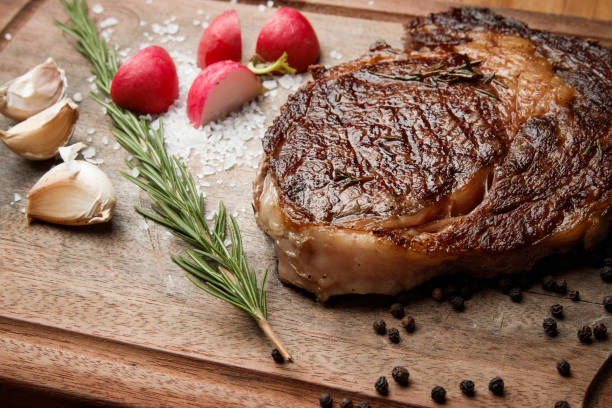 istock steak from beef, steak with vegetables, proper nutrition, healthy food, 1184653302