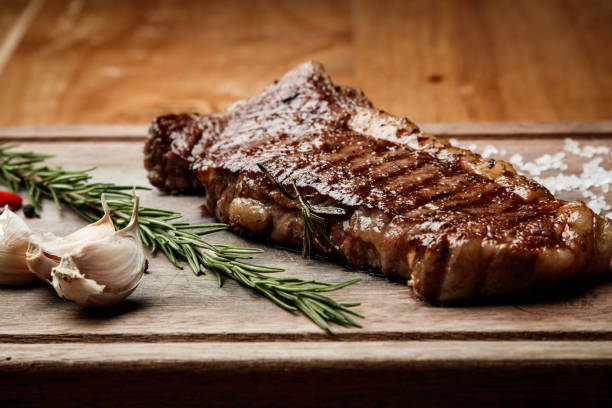istock steak from beef, steak with vegetables, proper nutrition, healthy food, 1184653449