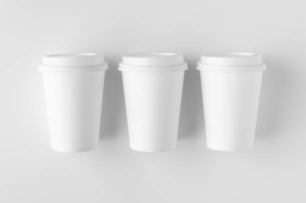 istock Top view of a 12 oz. white coffee paper cup mockup with lid. 1184653589