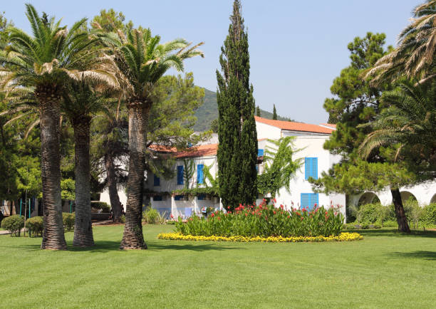 BUDVA,MONTENEGRO-  AUGUST 4.2017: The hotel is surrounded by greenery and palm trees