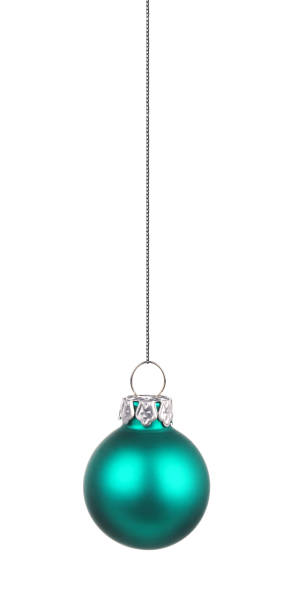 istock Hanging teal Christmas ornament isolated on white 1184657302