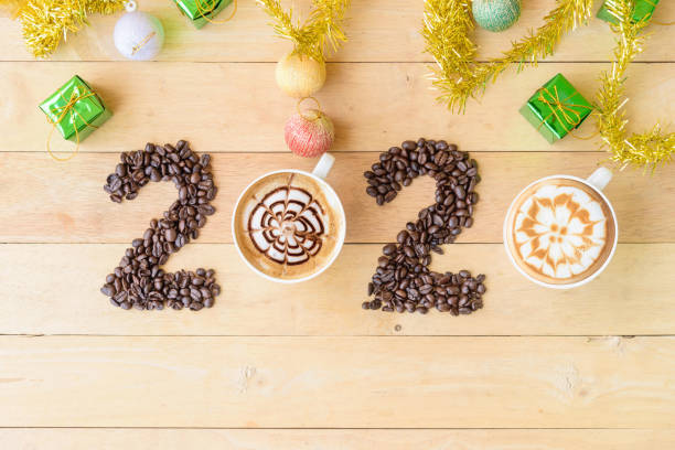 istock Hot cappuccino with coffee bean in 2020 year sign 1184657414