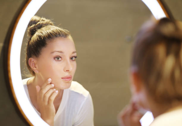 istock Magic anti-aging cream.Applying the cream 1184657706