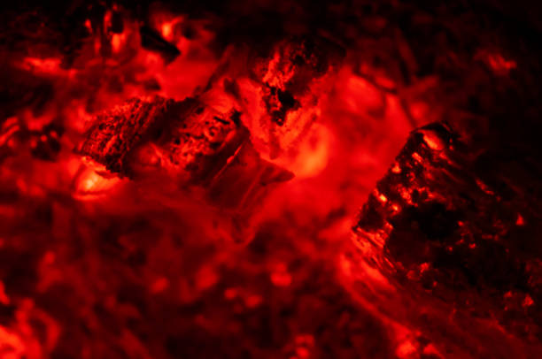 istock burning embers of fire- fire red 1184658787