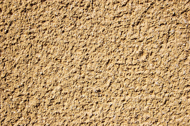 Plaster building compo, exterior stucco,  textured background stock photo