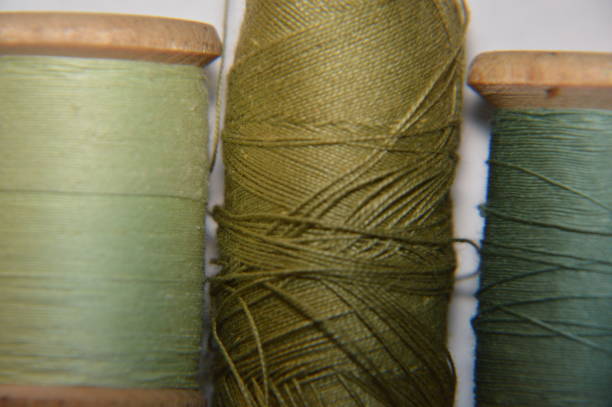 istock Spools of thread for sewing clothes close-up 1184659896