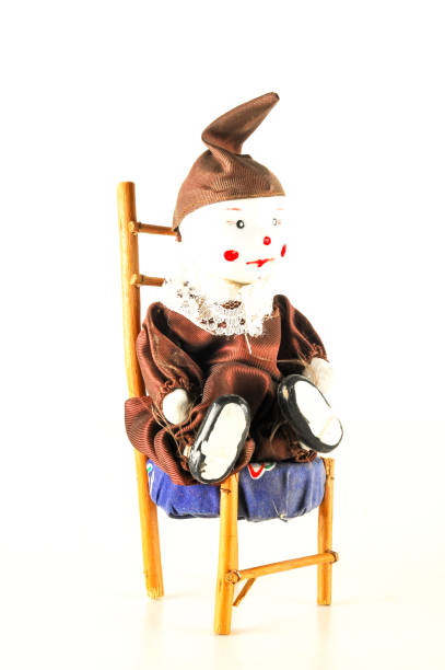 istock Pierrot toy doll on white background 1184660145