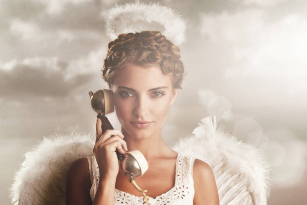 Female angel using phone