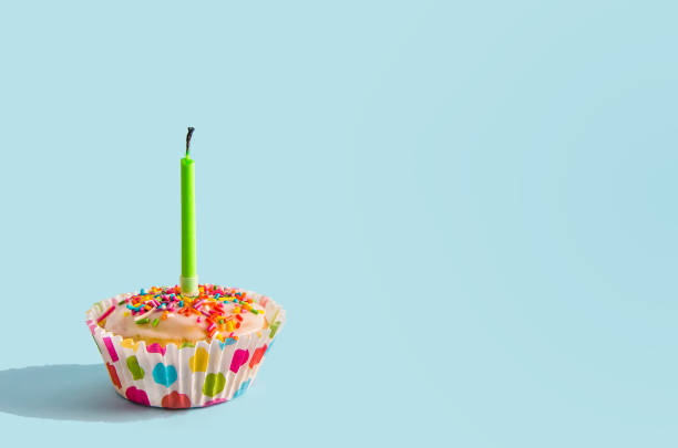 istock extinguished candle. The holiday is over. Cupcake. 1184663633