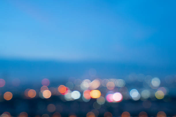 istock Blurred abstract grey glass blurred blue lights background 1184668839