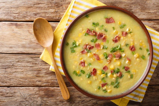 delicious vegetable corn chowder with bacon close-up in a bowl. horizontal top view - healthy eating portion onion lunch imagens e fotografias de stock