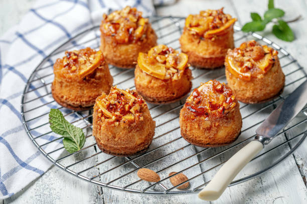 istock Delicious cupcakes with orange and almonds. 1184672592