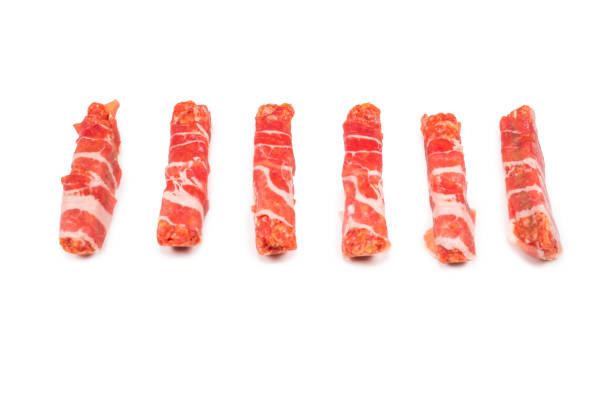 istock Chevapchichi in bacon isolated on white background. 1184675694