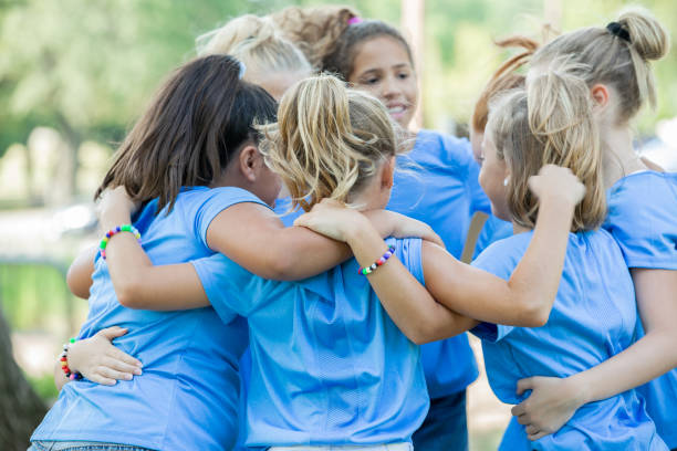 istock Team of girls get pumped up before game 1184676354