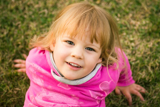 istock cute blonde little girl 1184678161