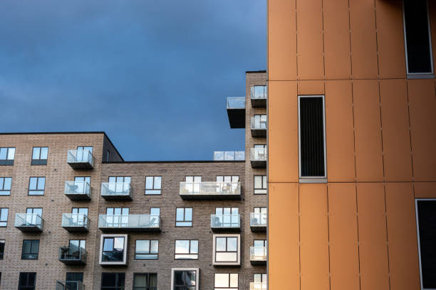 istock Modern Scandinavian architecture from Aarhus Island in Denmark. Buildings that utilizes a lot of window and glass to create gorgous colors 1184679316