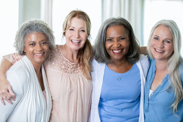istock Senior women with arms around each other 1184681239