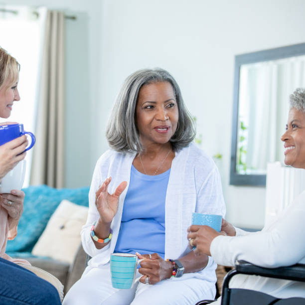 istock Women telling interesting story over coffee with friends 1184681447