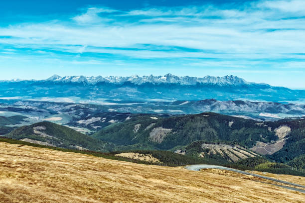 High Tatras mountain range from Kralova Hola in Low Tatras, Slovak republic. Seasonal natural scene. Travel destination.