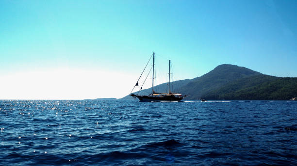 istock Datca harbor and sailing boats at sunset 1184691629