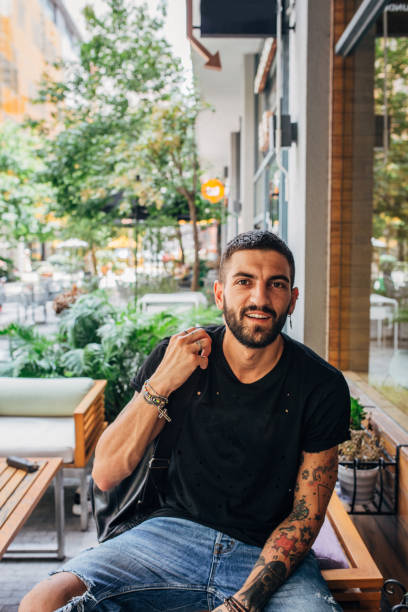 istock Handsome young man with tattoos 1184700560