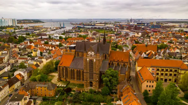 St. Georgen-Kirche,  St. George's Church, Wismar, Germany. View from above, beautiful aerial landscape, harbor, old church, red brick medieval building.