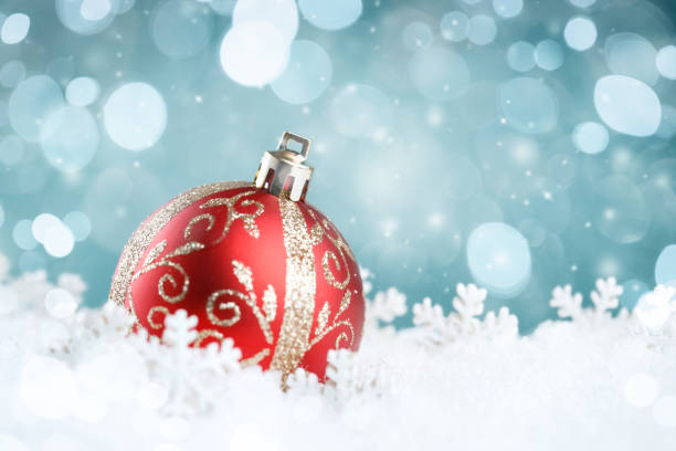 istock Christmas ball with snowflakes on abstract blue background. 1184702070
