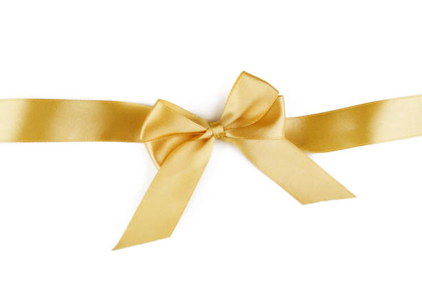 istock Christmas gold ribbon with bow isolated on white 1184702207