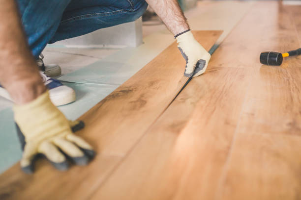 istock Laying a new laminate with a wooden pattern 1184703159