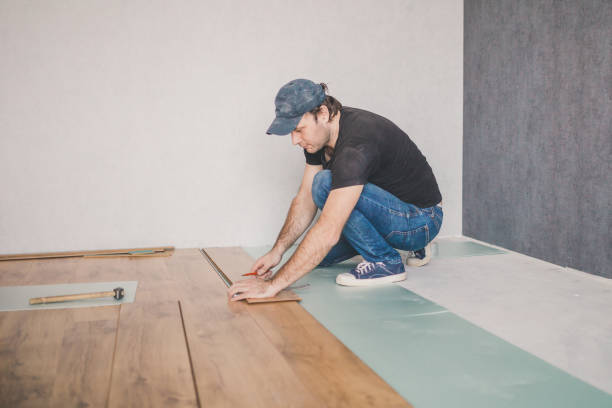 istock Finishing work at home - laying a laminate flooring 1184704029