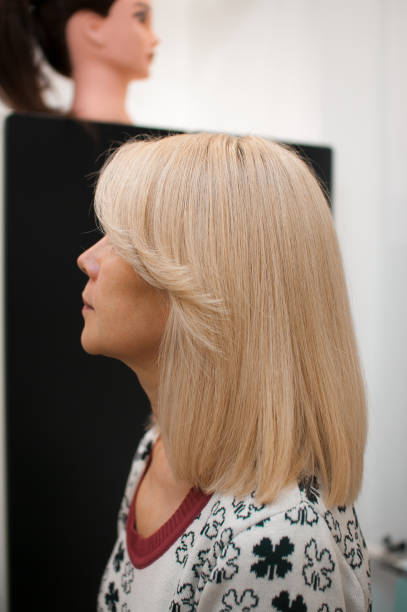 istock Blonde woman in profile 1184705994